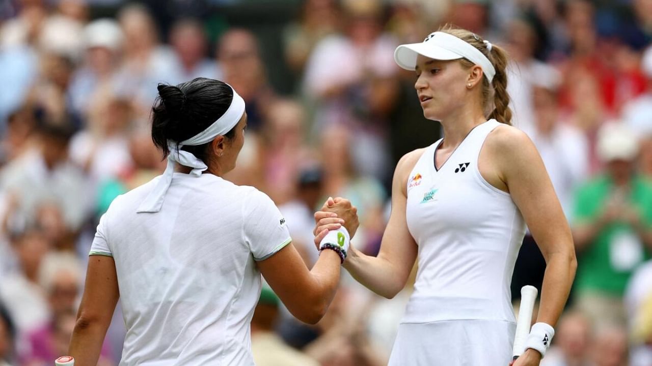 Tunisia's Ons Jabeur and Kazakhstan's Elena Rybakina shake hands after their quarter final match. Credit: Reuters Photo