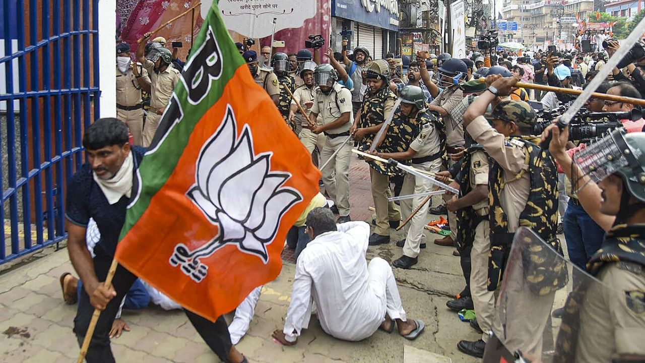 Security personnel baton charge BJP supporters during their Vidhan Sabha march in support of demands of teachers' job aspirants, in Patna. Credit: PTI Photo