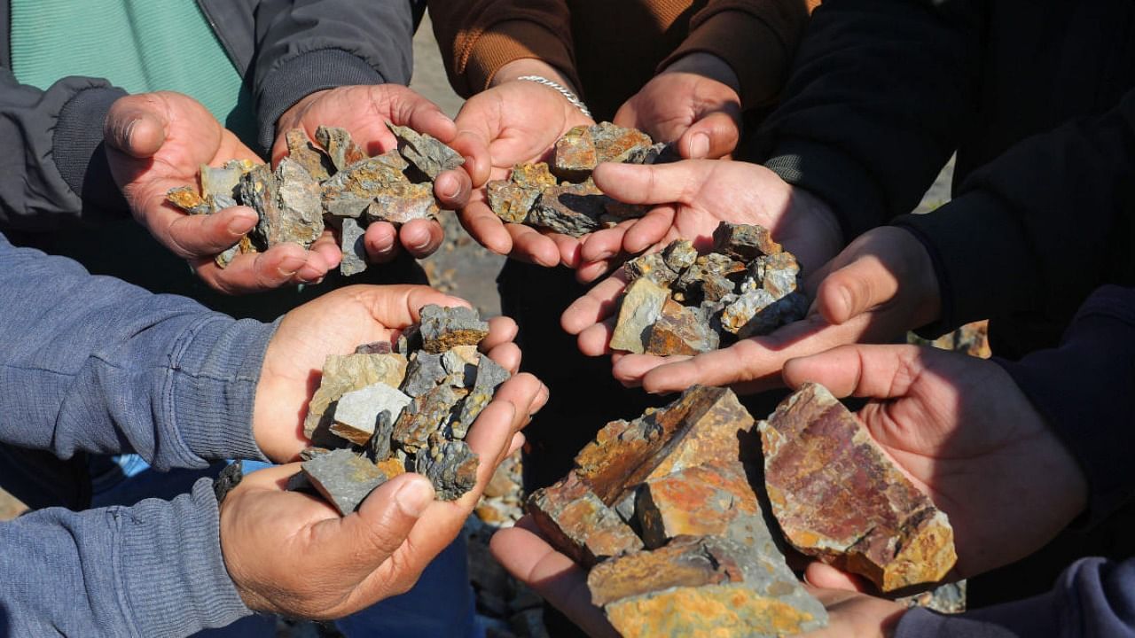 Villagers show lithium stones in Reasi district. Credit: PTI File Photo