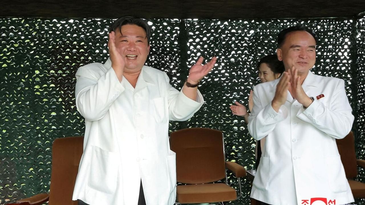 <div class="paragraphs"><p>North Korea's leader Kim Jong Un applauds as Hwasong-18 intercontinental ballistic missile is launched from an undisclosed location. </p></div>