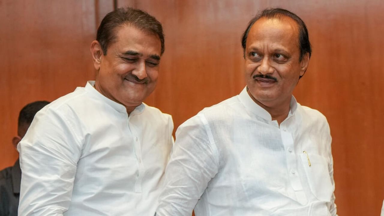 Maharashtra Deputy Chief Minister and NCP (Ajit faction) leader Ajit Pawar with party leader Praful Patel during a press conference in Mumbai, Friday, July 7, 2023. Credit: PTI File Photo