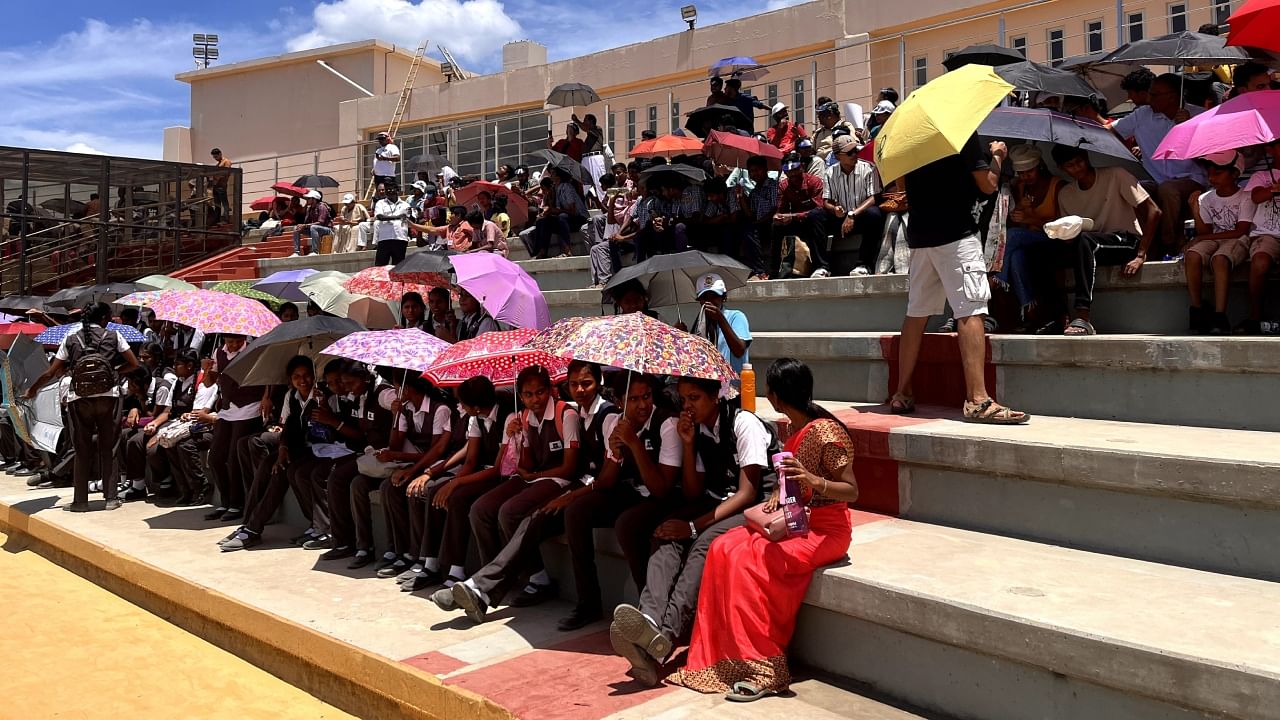 Thousands of students from across the country, including from far away Delhi and Noida, waited patiently for hours together under the blazing Sun to witness the “proud moment” from the new Visitors' gallery at the SDSC. Credit: Special Arrangement