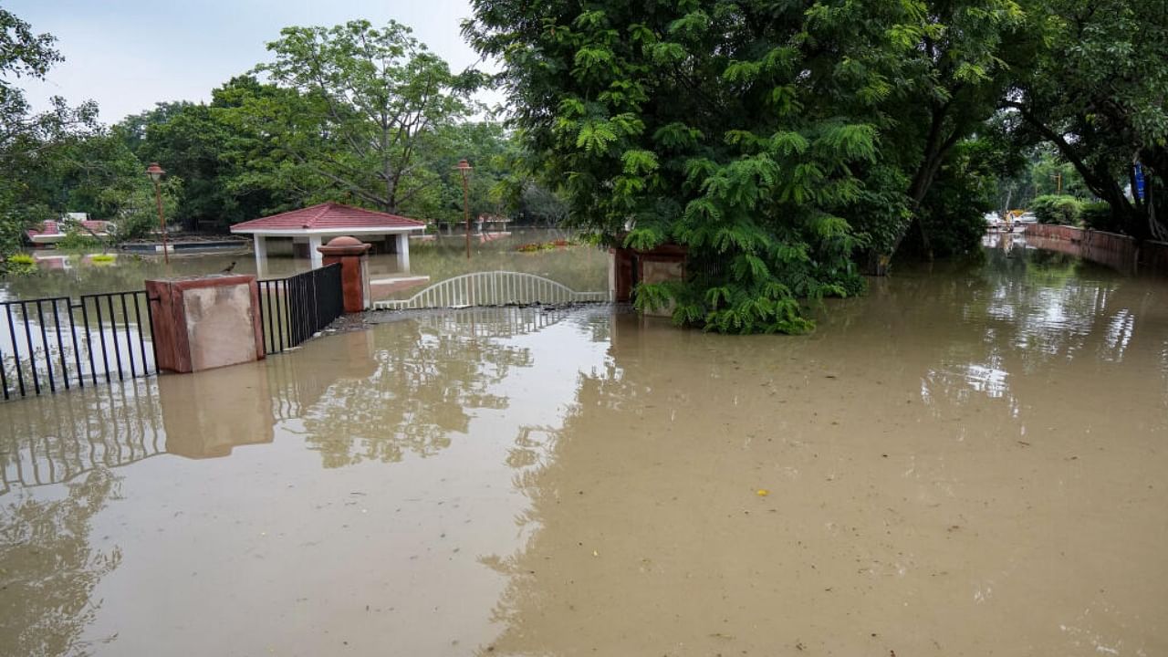 Flooding at Rajghat as the Yamuna river inundates nearby areas, in New Delhi, Friday, July 14, 2023. Credit: PTI Photo