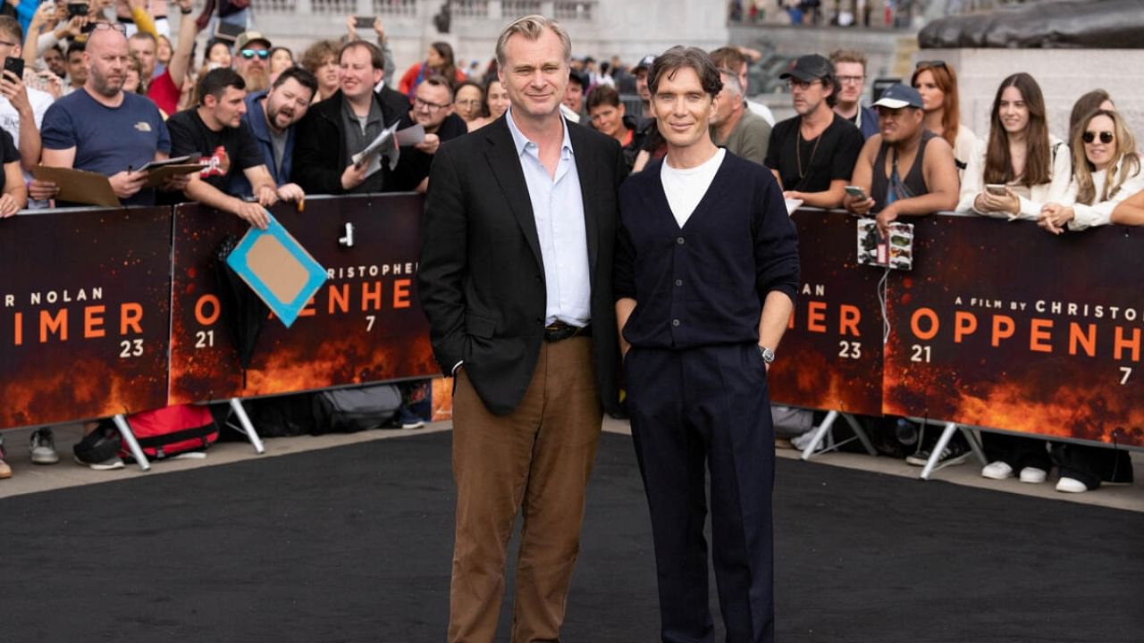 <div class="paragraphs"><p>'Oppenheimer' dirtector Christopher Nolan (left) and protagonist Cillian Murphy (right) attend a photo call for the movie in London. </p></div>