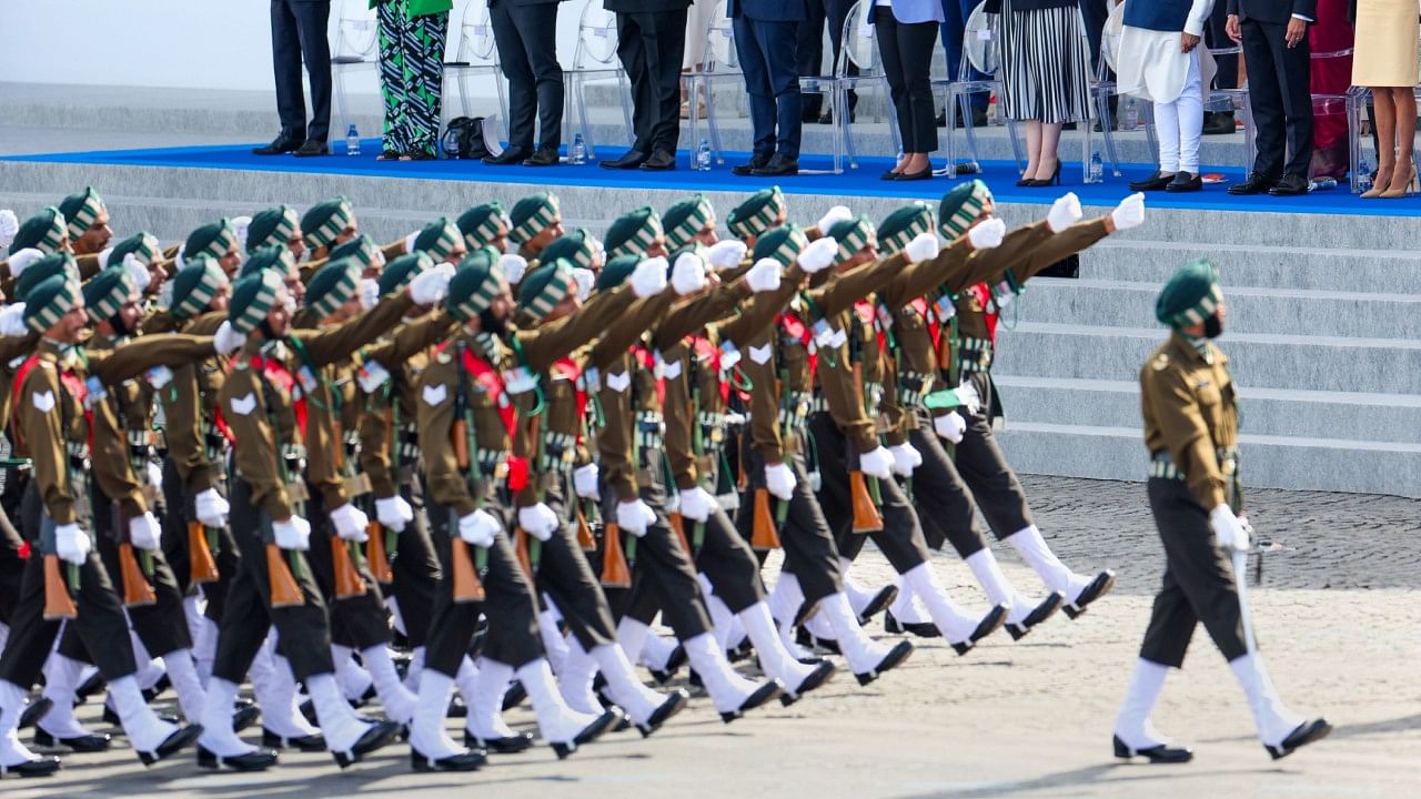 Prime Minister Narendra Modi takes the salute during Bastille Day Parade, in Paris. Credit: PTI Photo