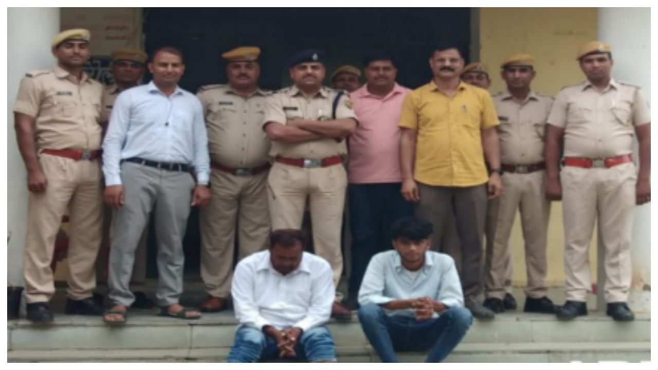 The accused father-son duo of Golu Meena and Amar Singh Meena under police custody. Credit: Facebook/@Karauli Police