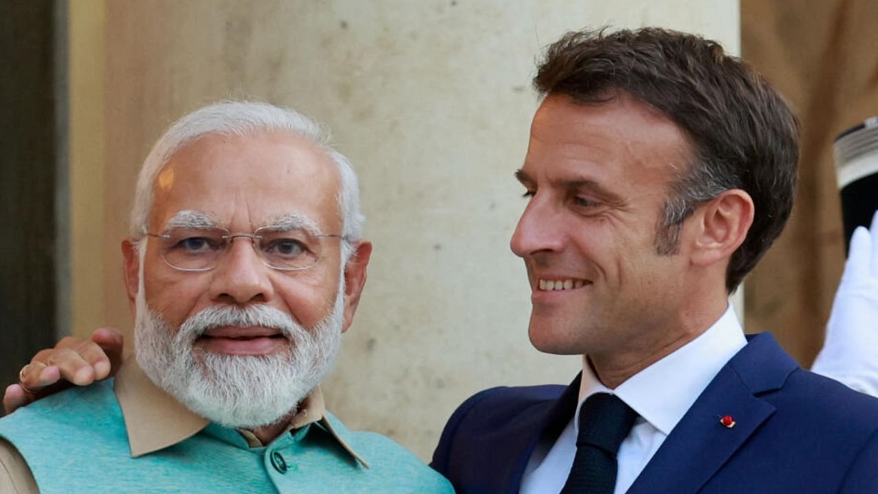 French President Emmanuel Macron and Indian Prime Minister Narendra Modi at the Elysee Palace, in Paris, France, July 13, 2023. Credit: Reuters Photo