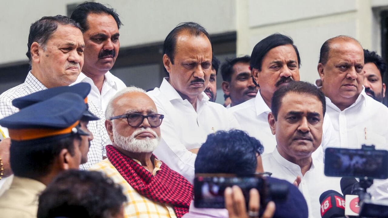 Maharashtra Deputy CM Ajit Pawar along with other party leaders after meeting with NCP president Sharad Pawar. Credit: PTI Photo