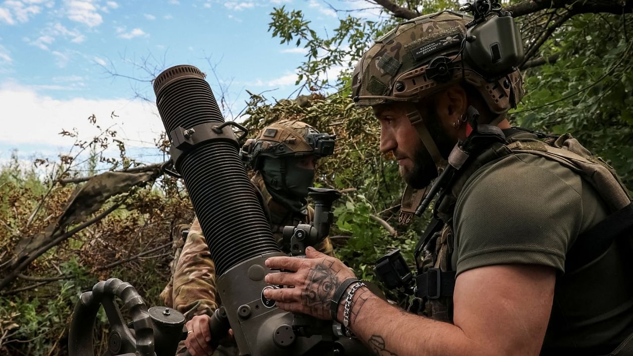 krainian servicemen, of the 10th separate mountain assault brigade of the Armed Forces of Ukraine, prepare to fire a mortar at their positions at a front line, amid Russia's attack on Ukraine, near the city of Bakhmut in Donetsk region, Ukraine July 13, 2023. Credit: Reuters Photo