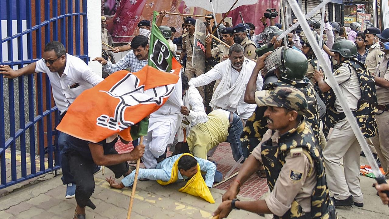 Security personnel baton charge BJP supporters during their Vidhan Sabha march in support of demands of teachers' job aspirants, in Patna, Thursday, July 13, 2023. Credit: PTI Photo