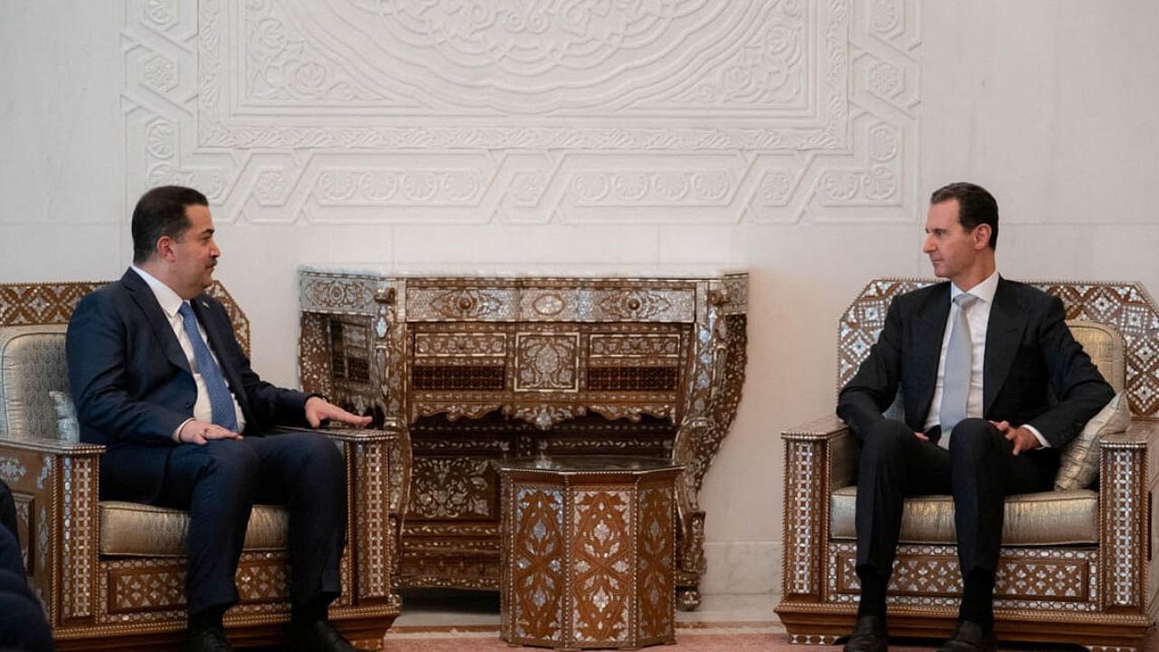 Iraqi Prime Minister Mohammed Shia Al-Sudani in Damascus with Syria's President Bashar al-Assad. Credit:  Reuters Photo