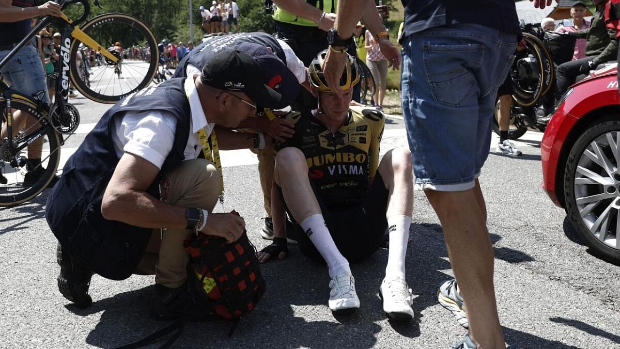 eam Jumbo–Visma's Nathan Van Hooydonck receives medical attention after a crash during stage 15. Credit: Reuters Photo