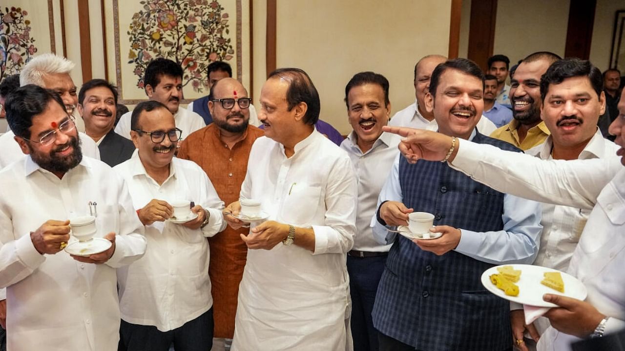 <div class="paragraphs"><p>Maharashtra CM Eknath Shinde along with Dy CMs Devendra Fadnavis and Ajit Pawar during a tea party ahead of the Maharashtra assembly monsoon session. The opposition alliance has boycotted the party.</p><p> </p></div>