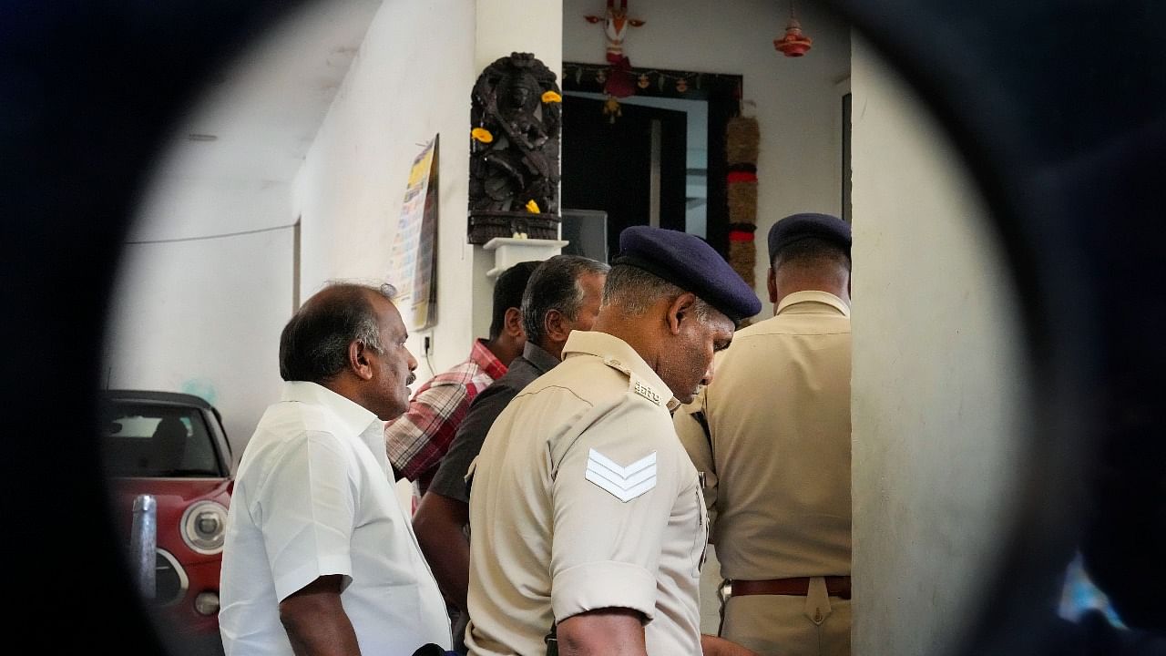 Security forces personnel during the Enforcement Directorate's searches at the premises of Tamil Nadu Higher Education Minister K Ponmudy in connection with a money laundering investigation, in Chennai. Credit: PTI Photo
