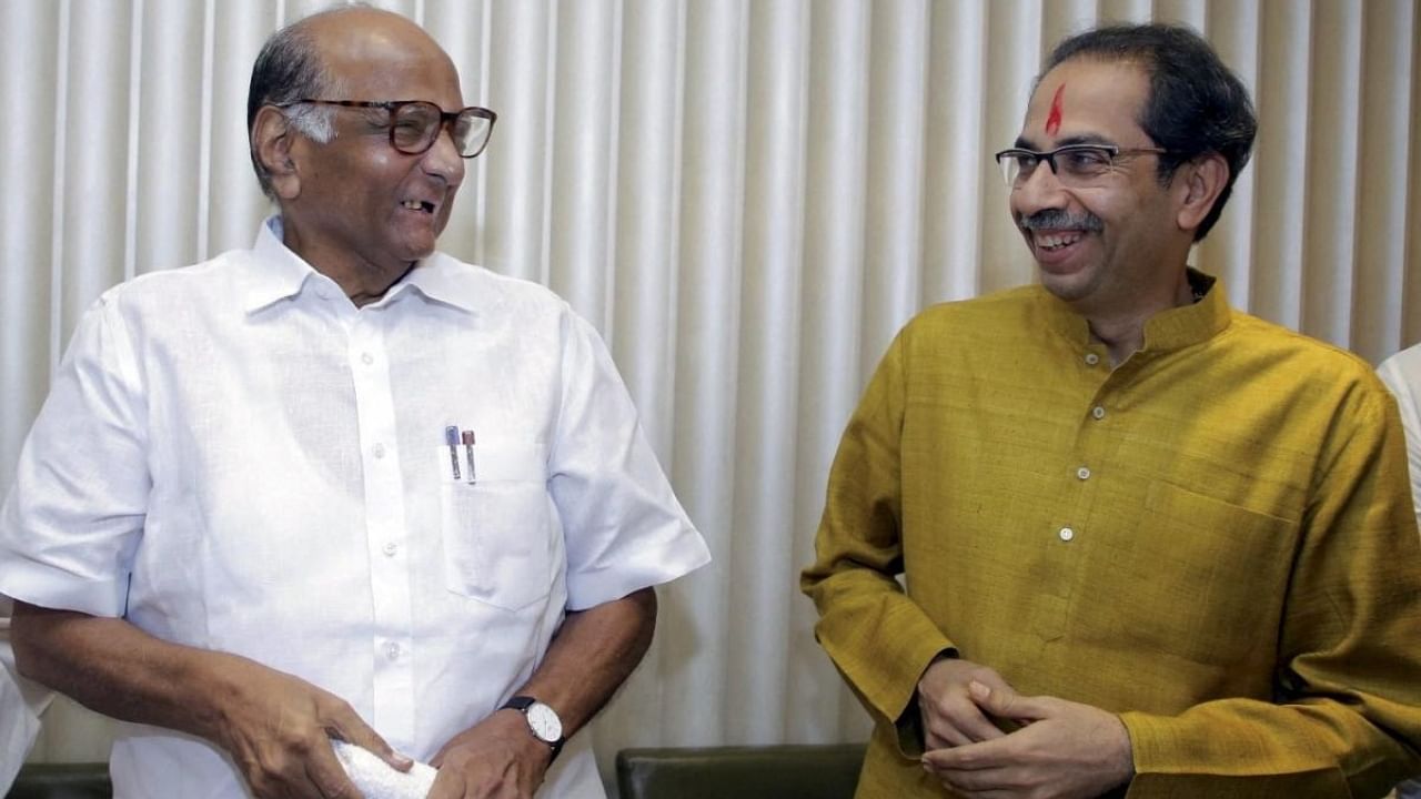 Shiv Sena President Uddhav Thackeray (R) and NCP supremo Sharad Pawar (L). Credit: PTI Photo