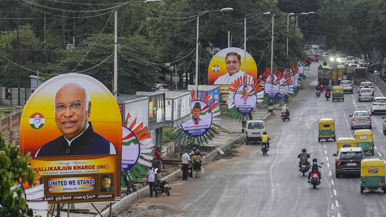 Posters of opposition parties' leaders put up on roadside before the opposition parties' meet, in Bengaluru, Monday, July 17, 2023. Credit: PTI Photo
