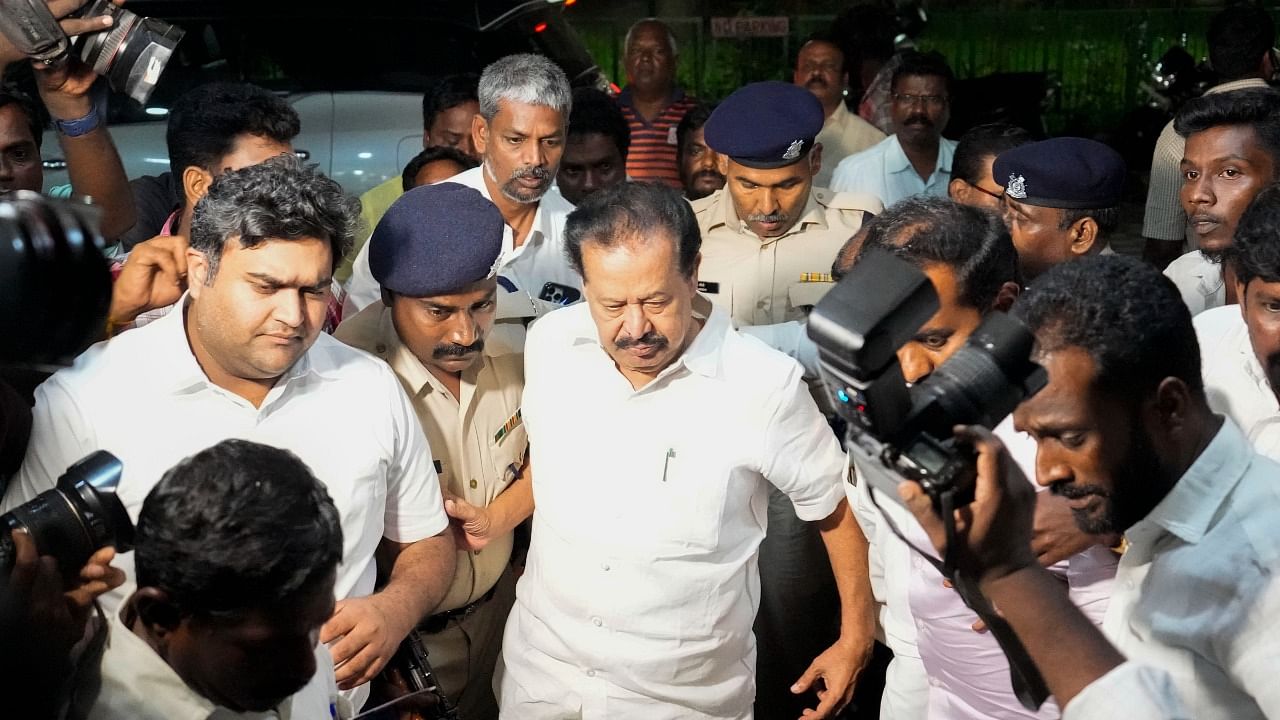  Enforcement Directorate officials take Tamil Nadu Higher Education Minister K Ponmudy for enquiry after day-long searches at his premises in connection with a money laundering case, in Chennai. Credit: PTI Photo