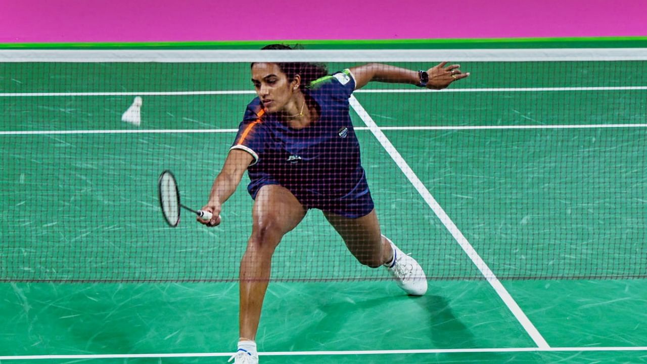  India's P.V. Sindhu returns to Fathimath Nabaaha Abdul Razzaq of Maldives in women's singles badminton match, during the Commonwealth Games 2022, in Birmingham, UK, Thursday, Aug 4, 2022. Credit: PTI Photo