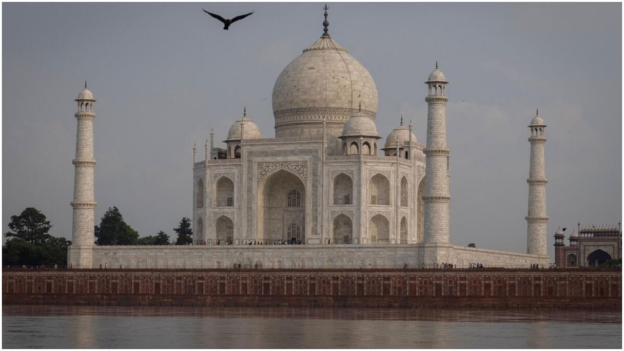 Tourists walk inside the historic Taj Mahal as the Yamuna river overflows following heavy rains, in Agra, India July 18, 2023. Credit: Reuters Photo