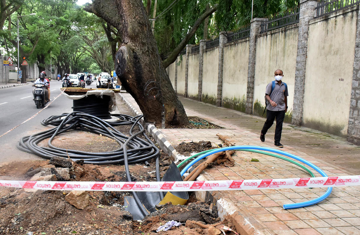 OFC cable works on New BEL road in Bengaluru on Thursday. Credit: DH Photo/BK Janardhan