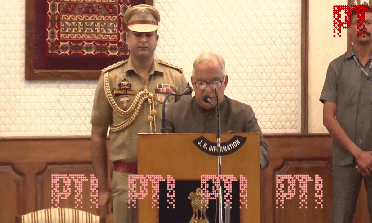 Jammu and Kashmir Lieutenant Governor Manoj Sinha administered the oath of office to Sharma at the Raj Bhavan. Credit: PTI Photo