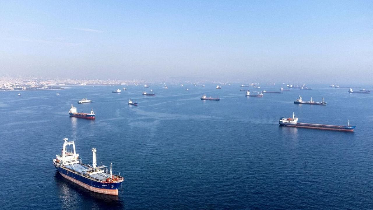 Commercial vessels including vessels which are part of Black Sea grain deal wait to pass the Bosphorus strait off the shores of Yenikapi during a misty morning in Istanbul, Turkey, October 31, 2022.  Credit: Reuters Photo