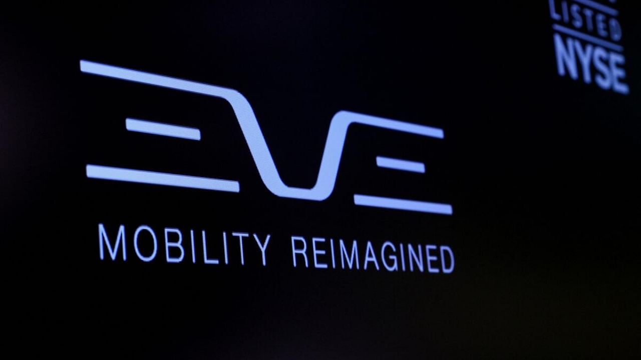 The logo for Eve Air Mobility is displayed on a screen during the company’s debut on the floor of the New York Stock Exchange (NYSE) in New York City, US, May 10, 2022. Credit: Reuters Photo