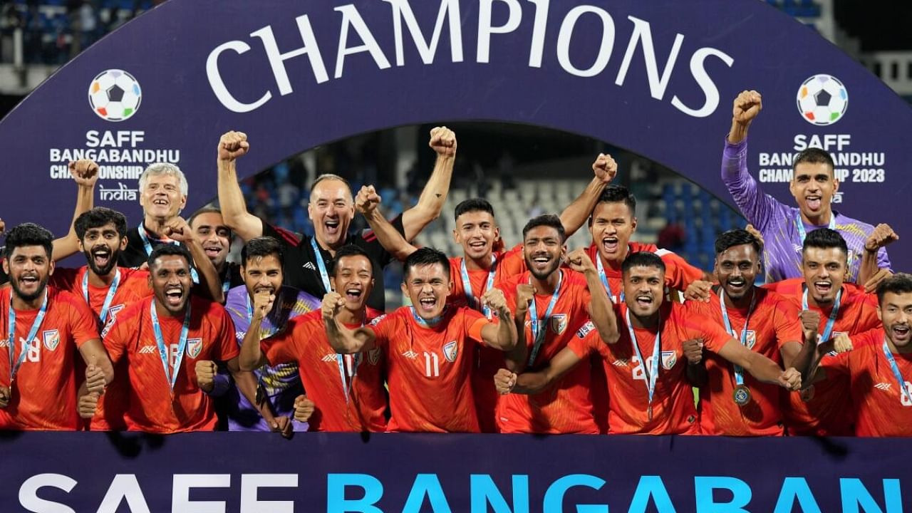 Indian football team players celebrate with the SAFF Championship 2023 trophy. Credit: PTI Photo