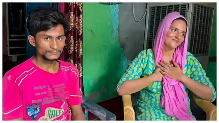 Pakistan's Seema Haider and India's Sachin Meena speak to media after they walked out of a jail, in Greater Noida. Credit: PTI Photo