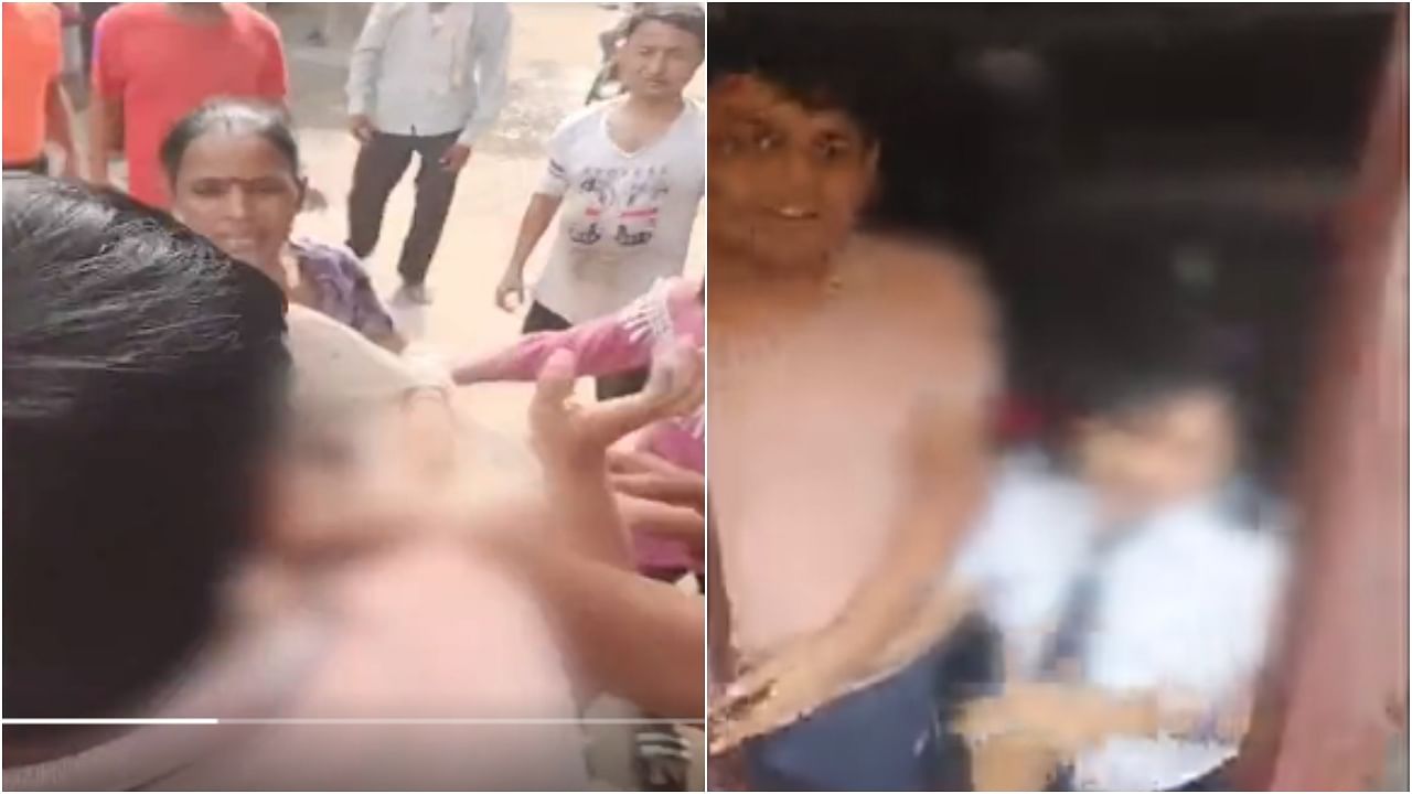 In a purported video of the incident, the mob could be seen attacking the accused couple. Some of the women were also seen slapping and pulling the hair of the accused woman, who was in her uniform. Credit: Twitter/@ANI