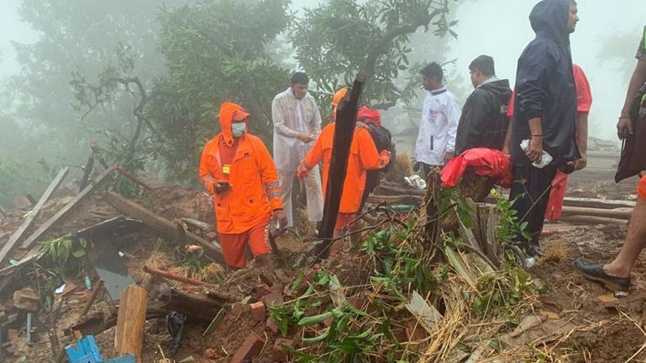 NDRF personnel during a search and rescue operation after a landslide at Irshalwadi village in Raigad district. Credit: PTI Photo