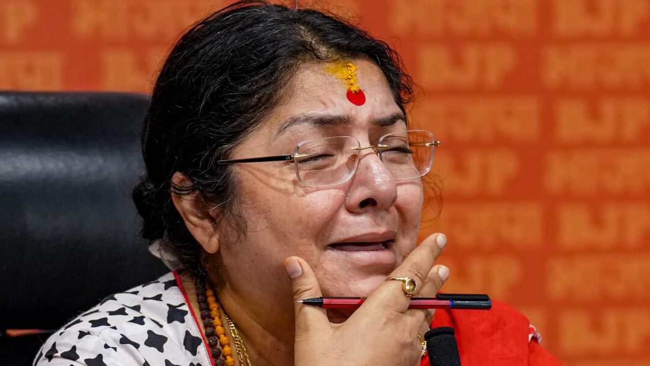 BJP MP Locket Chatterjee breaks down while recounting an alleged incident of sexual assault case in West Bengal, during a press conference at BJP HQ, in New Delhi, Friday, July 21, 2023. Credit: PTI Photo