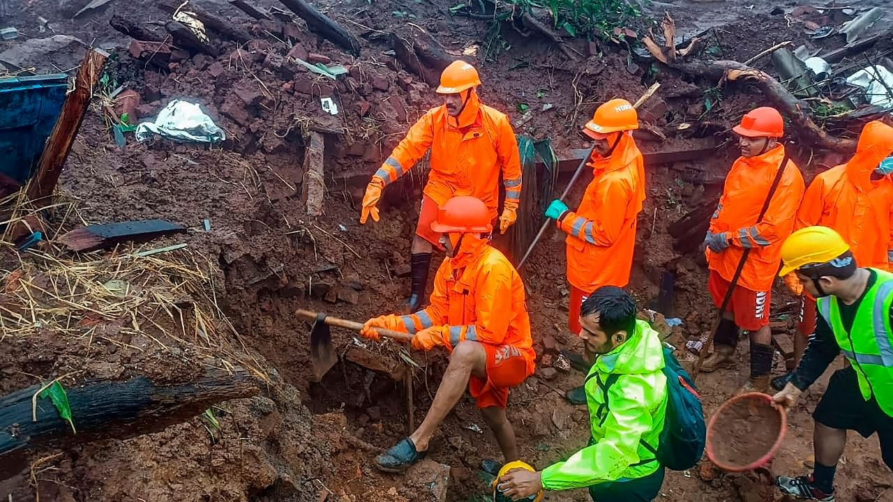 NDRF personnel during a search and rescue operation after a landslide at Irshalwadi village in Raigad district, Friday, July 21, 2023. Credit: PTI Photo