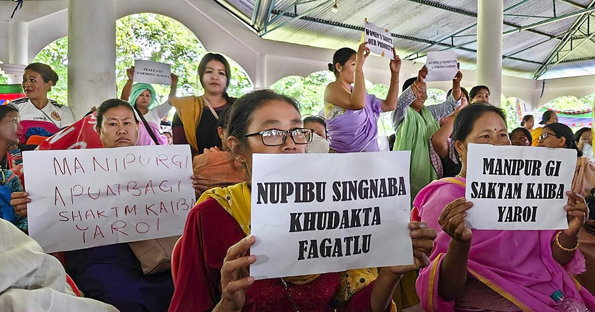 Women stage a protest over sexual violence against females in Manipur, in Imphal, Friday, July 21, 2023. Credit: PTI Photo