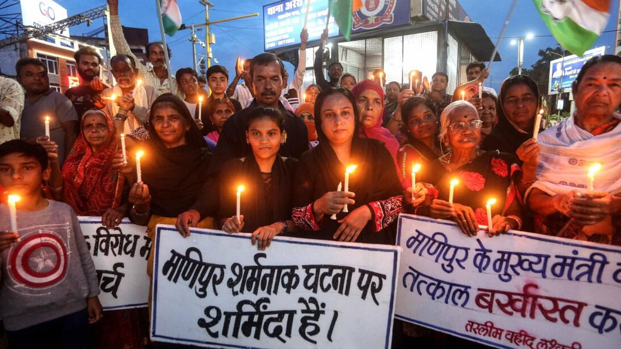 Candle march to protest against violence in Manipur. Credit: PTI Photo