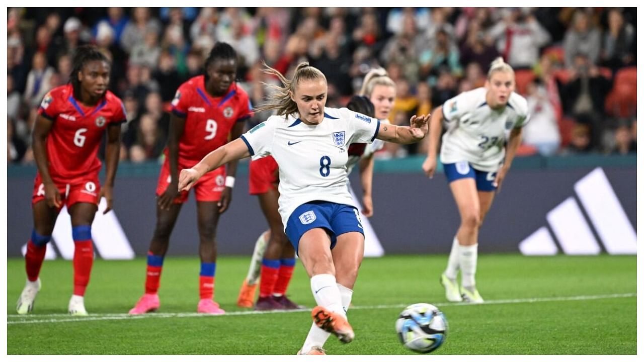 England's Georgia Stanway scores their first goal from the penalty spot. Credit: Reuters Photo