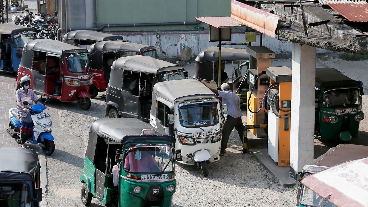 Three wheeler drivers wait in line to top up their tanks at a Ceylon Petroleum Corporation fuel station in Colombo, Sri Lanka February 21, 2022. Credit: Reuters File Photo