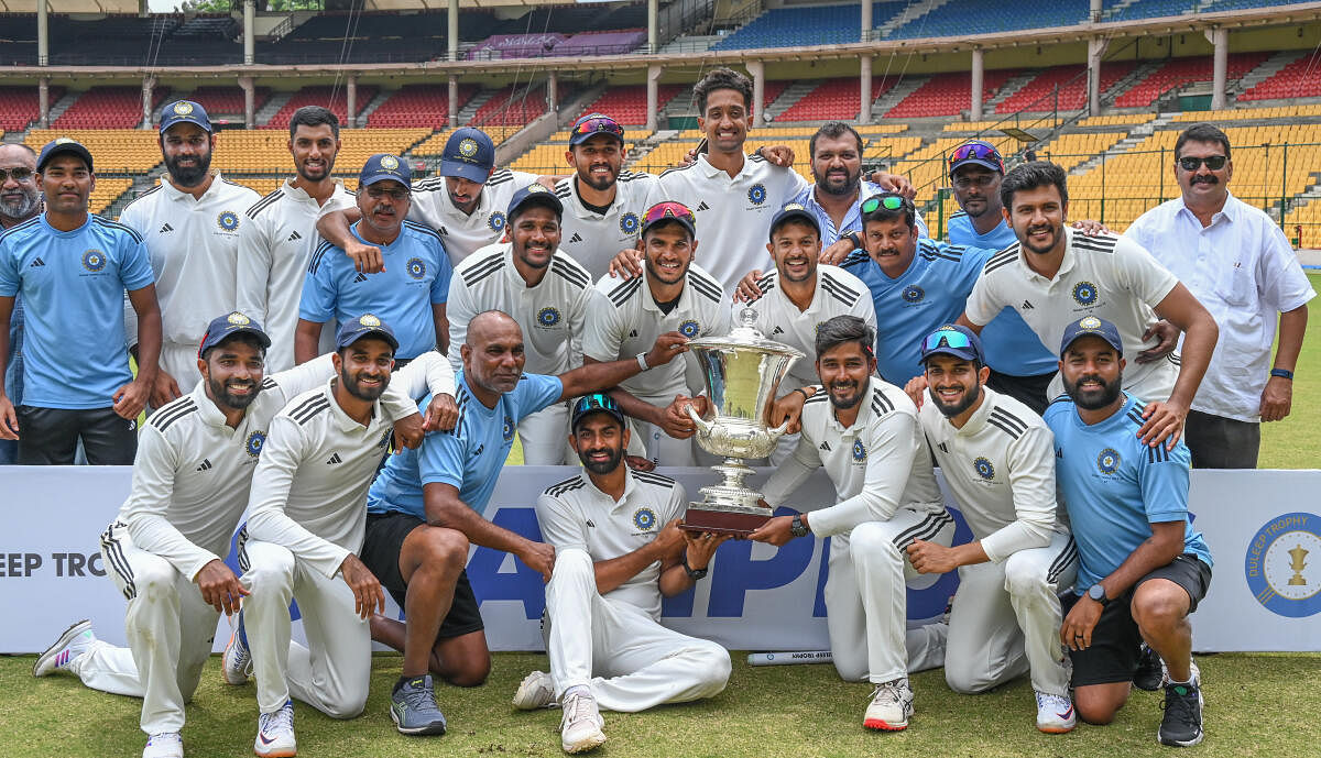 South Zone celebrate after winning the Duleep Trophy following their 75-run win in the final against West Zone at the M Chinnaswamy Stadium in Bengaluru on Sunday. DH Photo/ SK Dinesh
