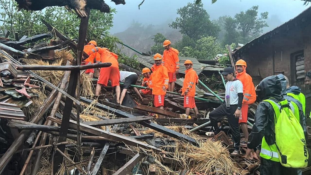 NDRF personnel during a search and rescue operation after a landslide at Irshalwadi in Raigad. Credit: PTI File Photo