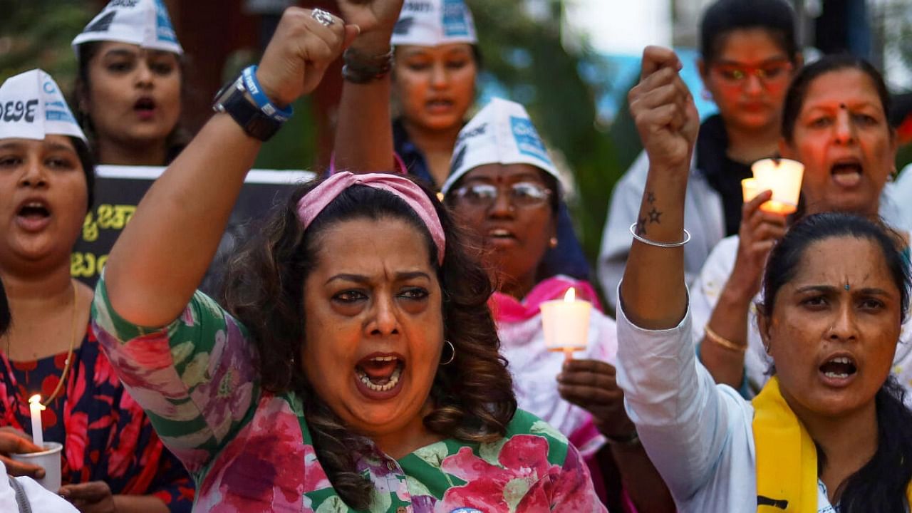 Aam Aadmi Party members shout slogans during a protest over Manipur violence issues. Credit: PTI File photo