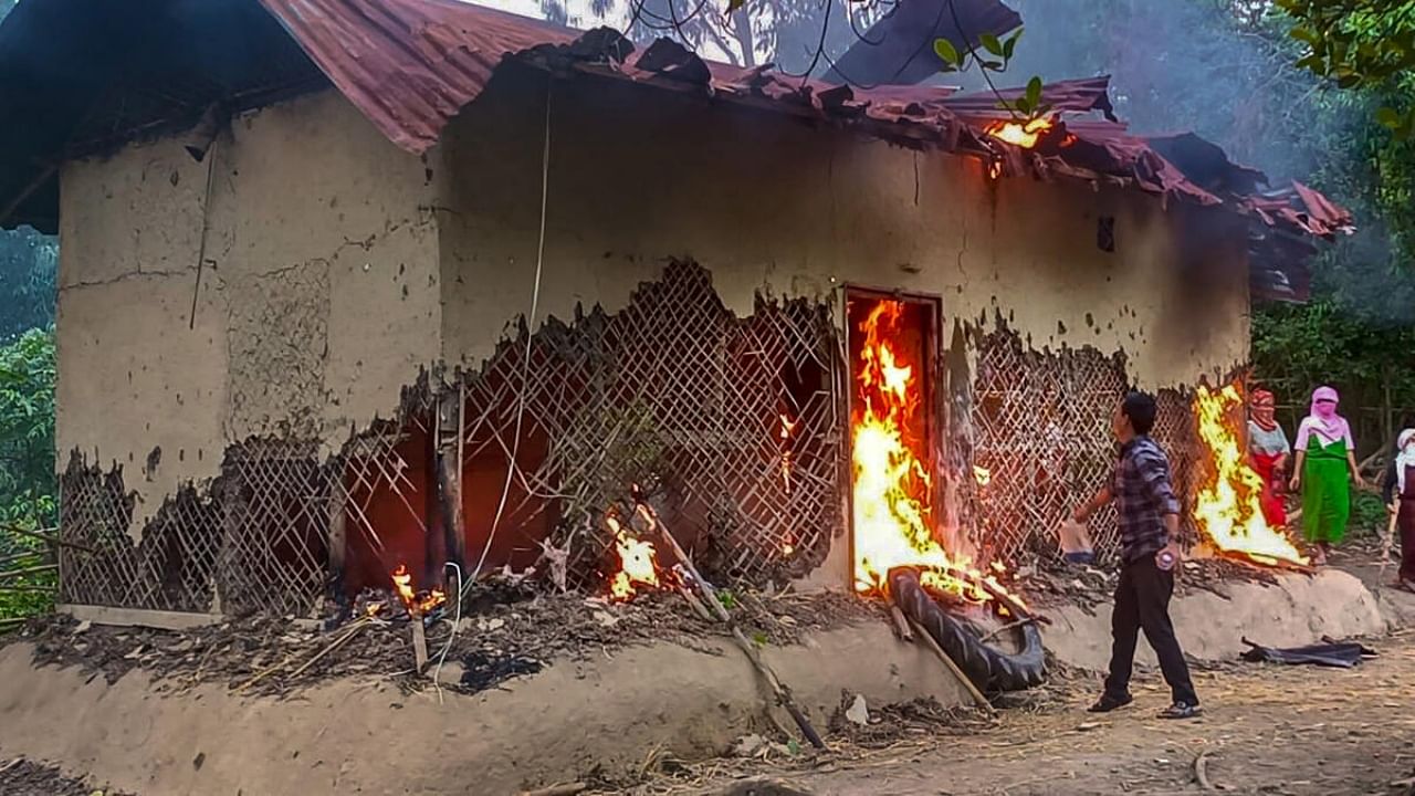 House being burnt in Manipur. Representative Image. Credit: PTI Photo