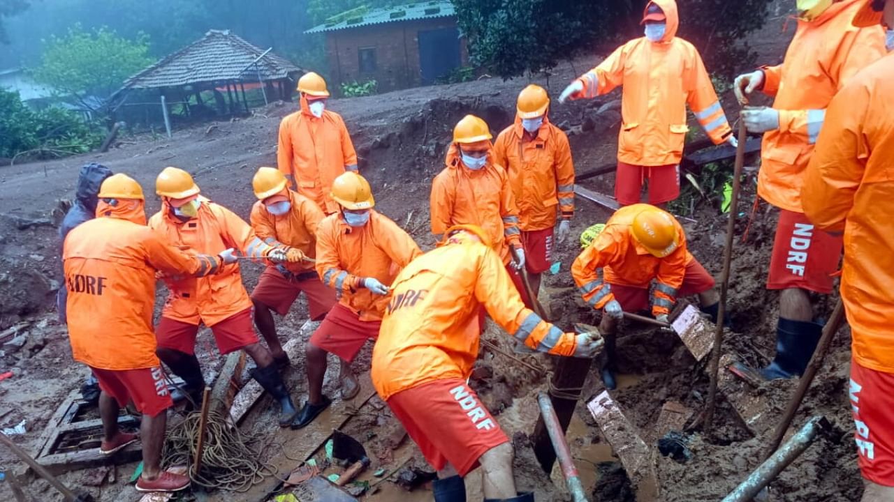 NDRF personnel during a search and rescue operation after a landslide at Irshalwadi village in Raigad district. Credit: PTI Photo