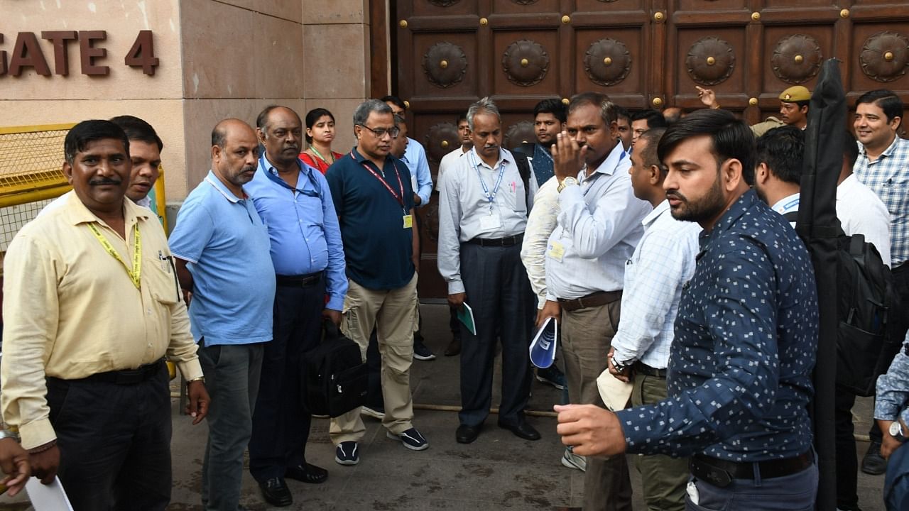 Members of the Archaeological Survey of India (ASI) upon their arrival at the Gyanvapi Mosque complex to conduct a scientific survey, in Varanasi. Credit: PTI Photo