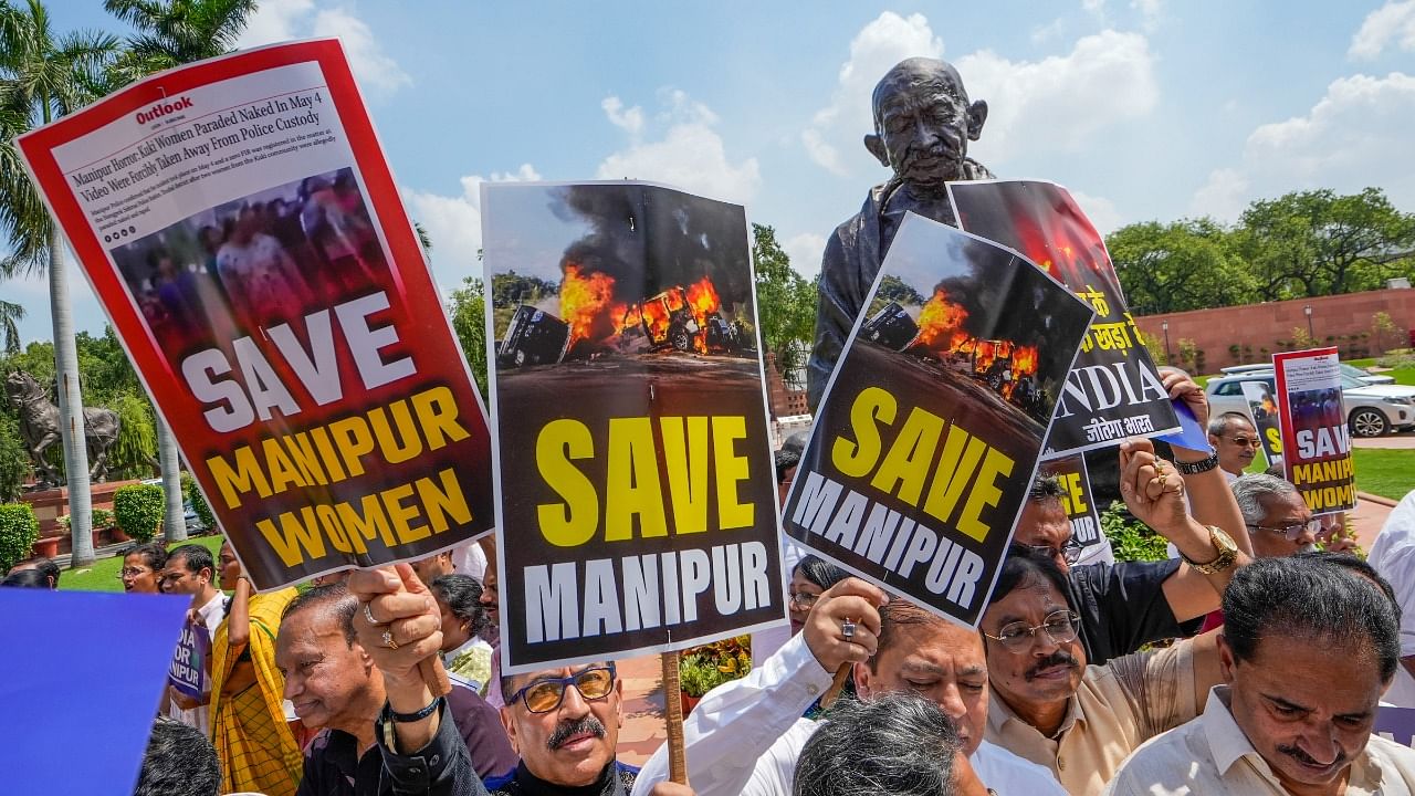 Placards used by leaders of the I.N.D.I.A. alliance parties during their protest over ethnic violence in Manipur during Monsoon session of Parliament, in New Delhi. Credit: PTI Photo