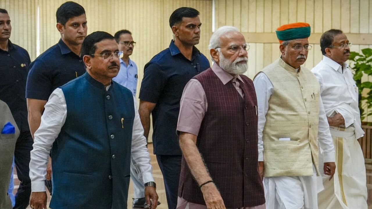 PM Modi with Union Ministers Arjun Ram Meghwal, Pralhad Joshi and Jitendra Singh arrives for the BJP parliamentary party meeting. Credit: PTI Photo
