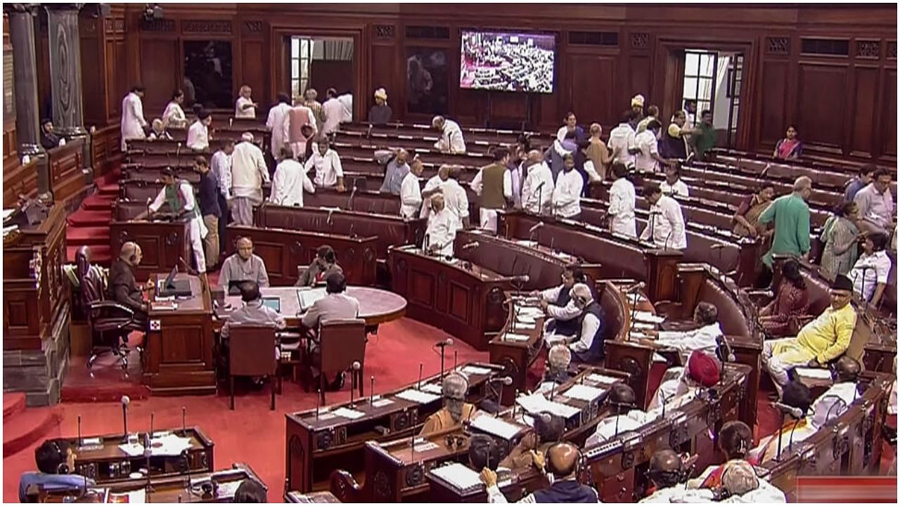  New Delhi: Opposition MPs stage a walkout from the Rajya Sabha during the Monsoon session of Parliament, in New Delhi, Tuesday, July 25, 2023. Credit: PTI Photo