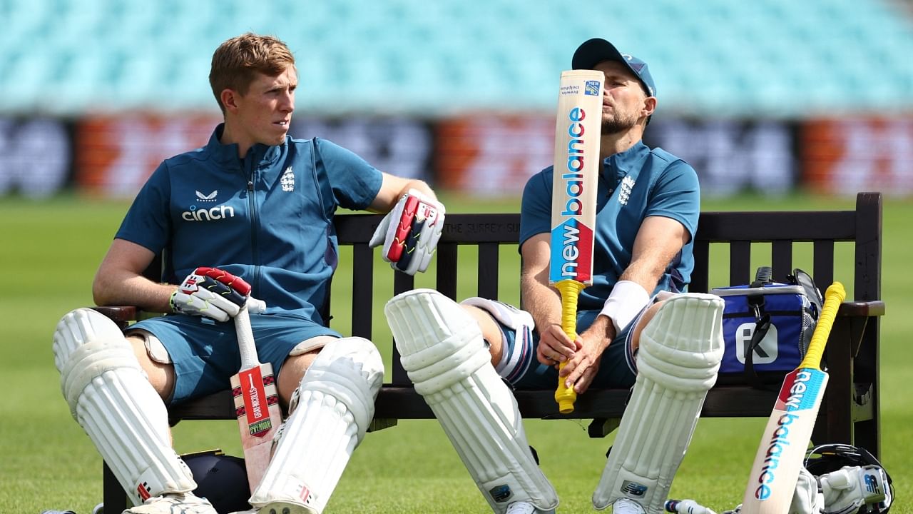 England's Zak Crawley and Joe Root during training, July 26, 2023. Credit: Action Images via Reuters Photo