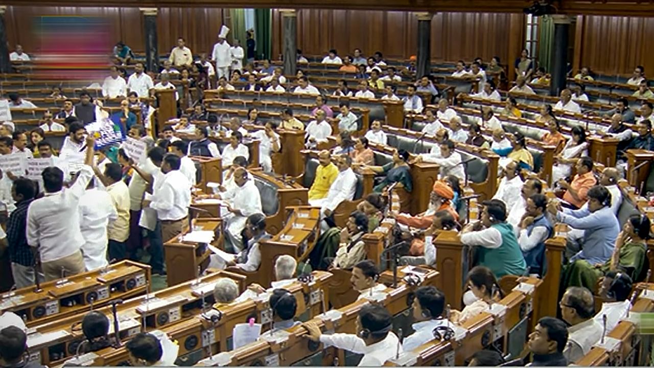 Opposition MPs protest in the Lok Sabha during the Monsoon session of Parliament, in New Delhi, Wednesday, July 26, 2023. Credit: PTI Photo