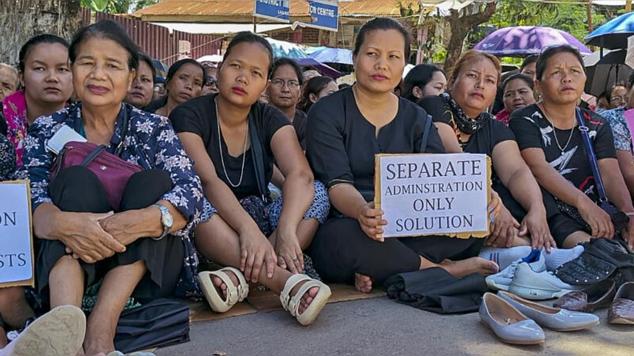 Women from the Zo-Kuki community stage a protest demanding separate administration for Tribals of Manipur, in Churachandpur, Tuesday, July 25, 2023. Credit: PTI Photo