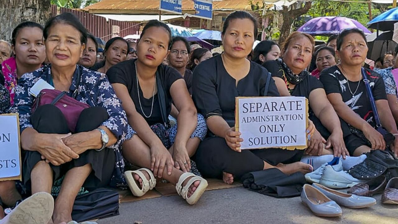 <div class="paragraphs"><p>Women from the Kuki-Zo community stage a protest demanding separate administration for Tribals of Manipur, in Churachandpur. </p></div>